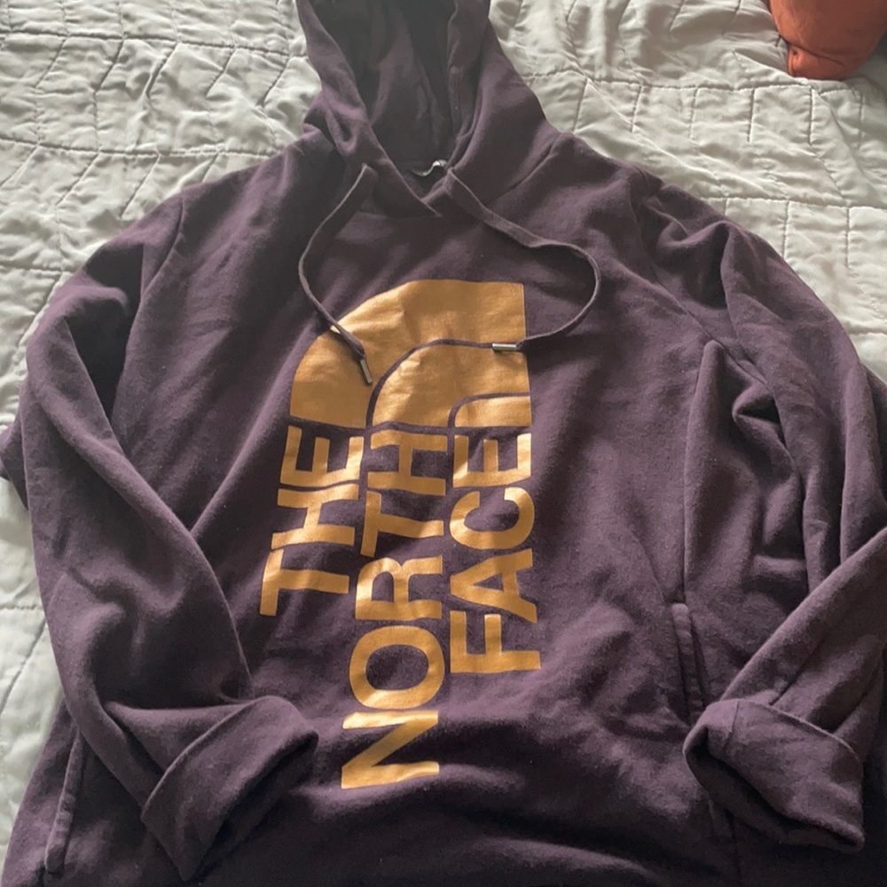 The North Face Purple Hoodie with Gold Logo